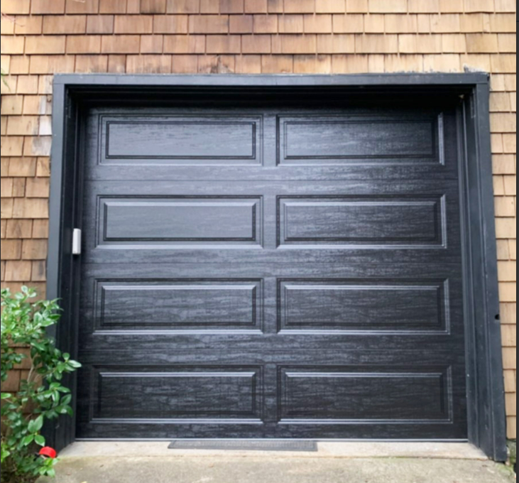 Local garage door repair service van in Bradenton, FL with a technician repairing a residential garage door, featuring the company logo and contact information.