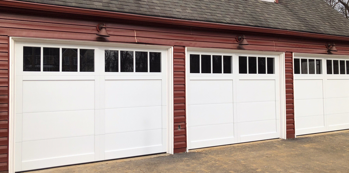 Custom garage door installed in a Bradenton, FL residential home, featuring unique design and high-quality craftsmanship